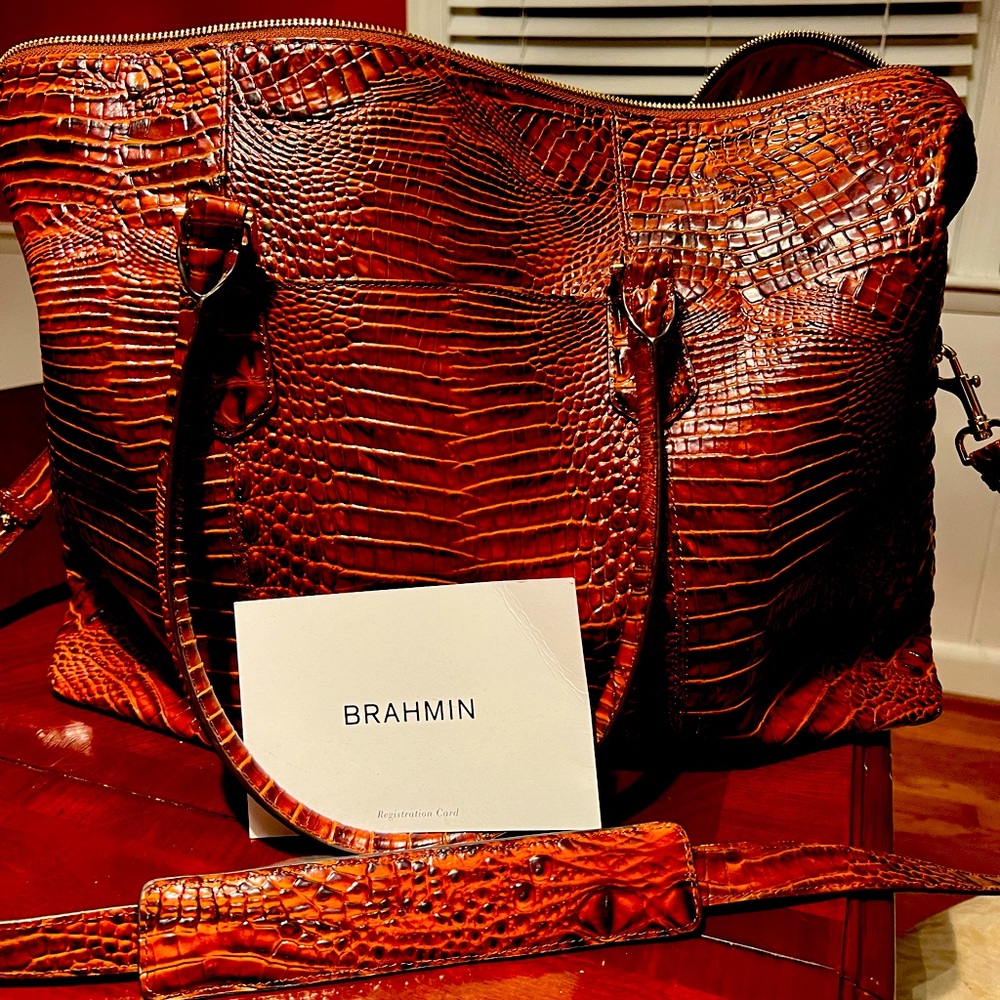 Brahmin duffle bag with original certificate. Gently used.  Arm and hand straps